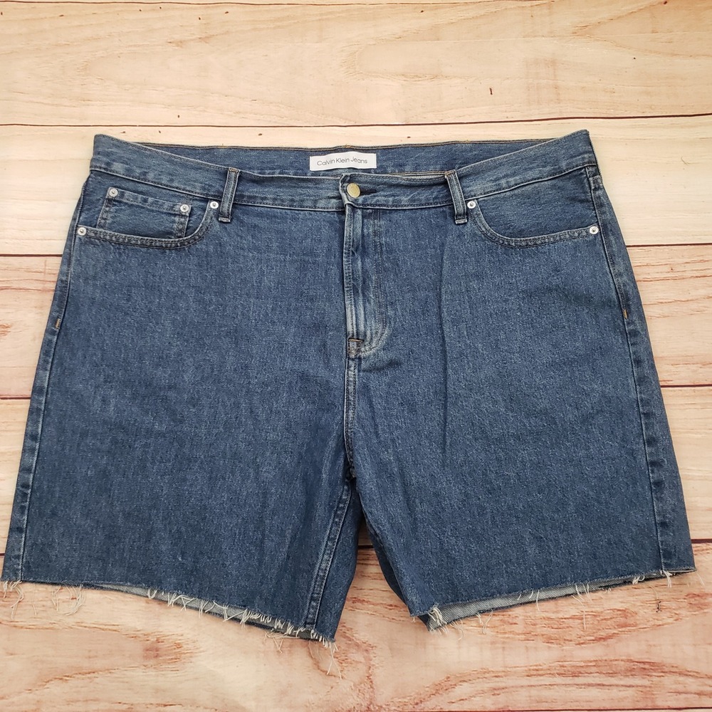 Calvin Klein Jean Shorts Womens Size 40‎ Denim Blue Raw Hem Pockets Ladies
